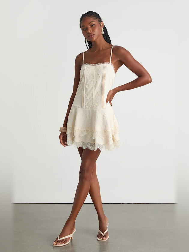 Cream mini homecoming dress, alternate view showing the dress shape and hem