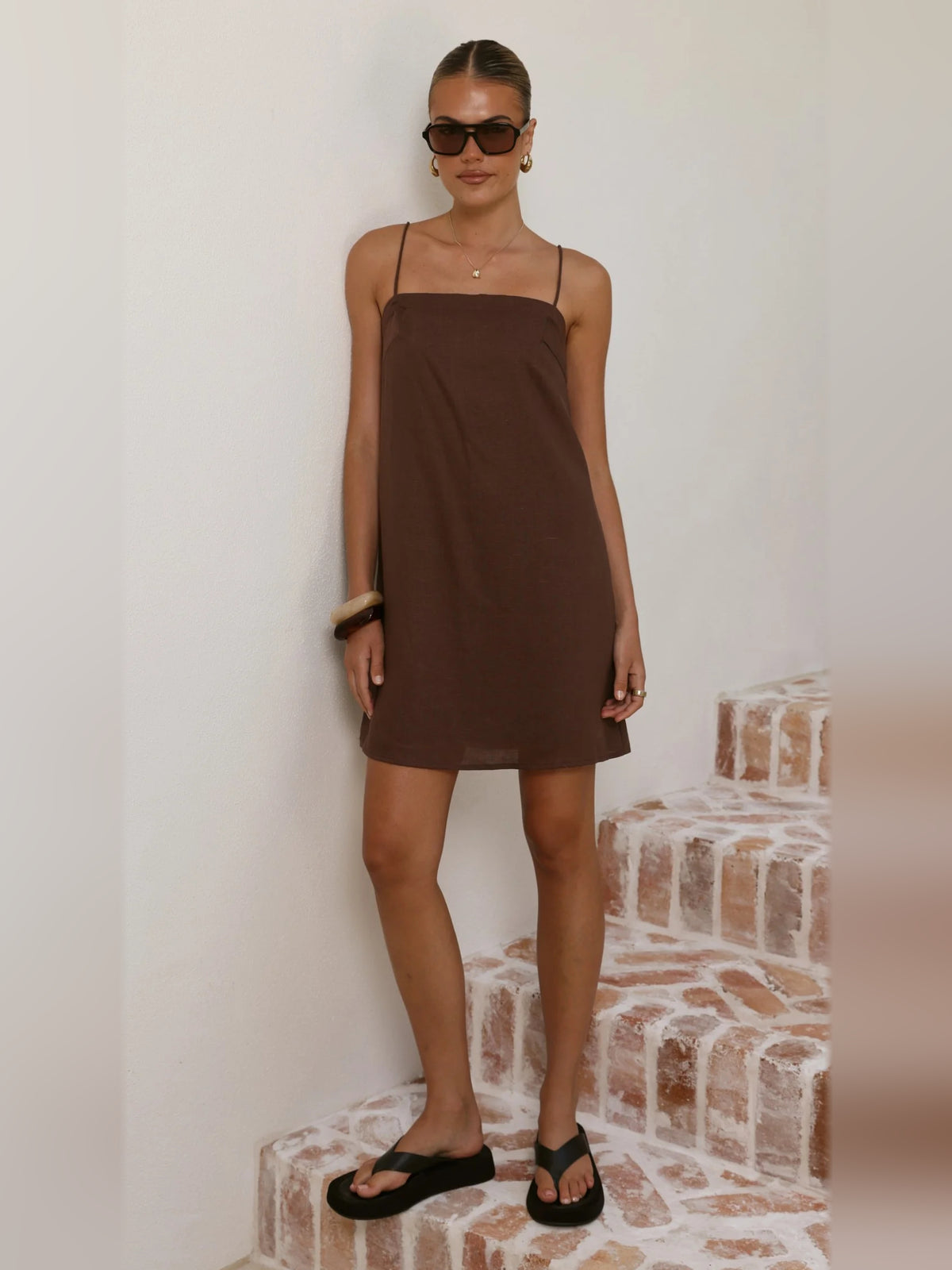 Brown mini homecoming dress, alternate view showing the dress shape and hem