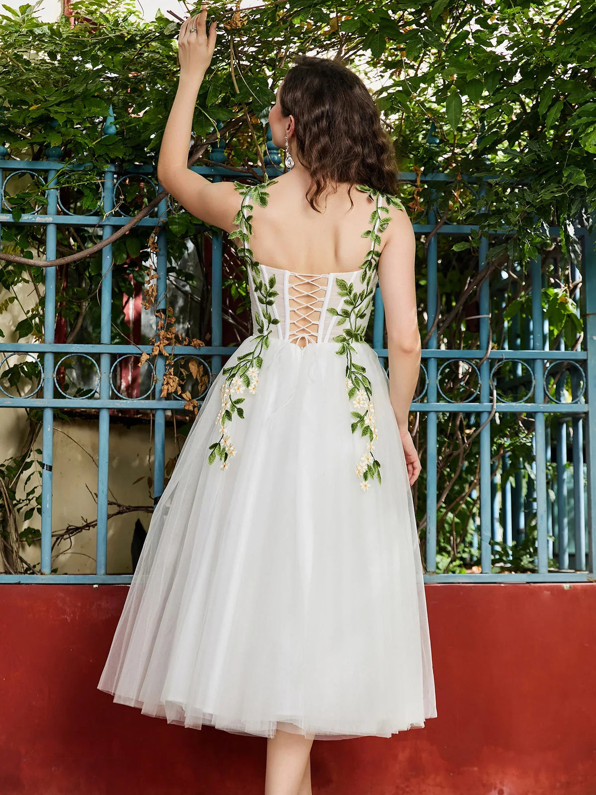 White midi prom dress, alternate view showing the dress shape and hem