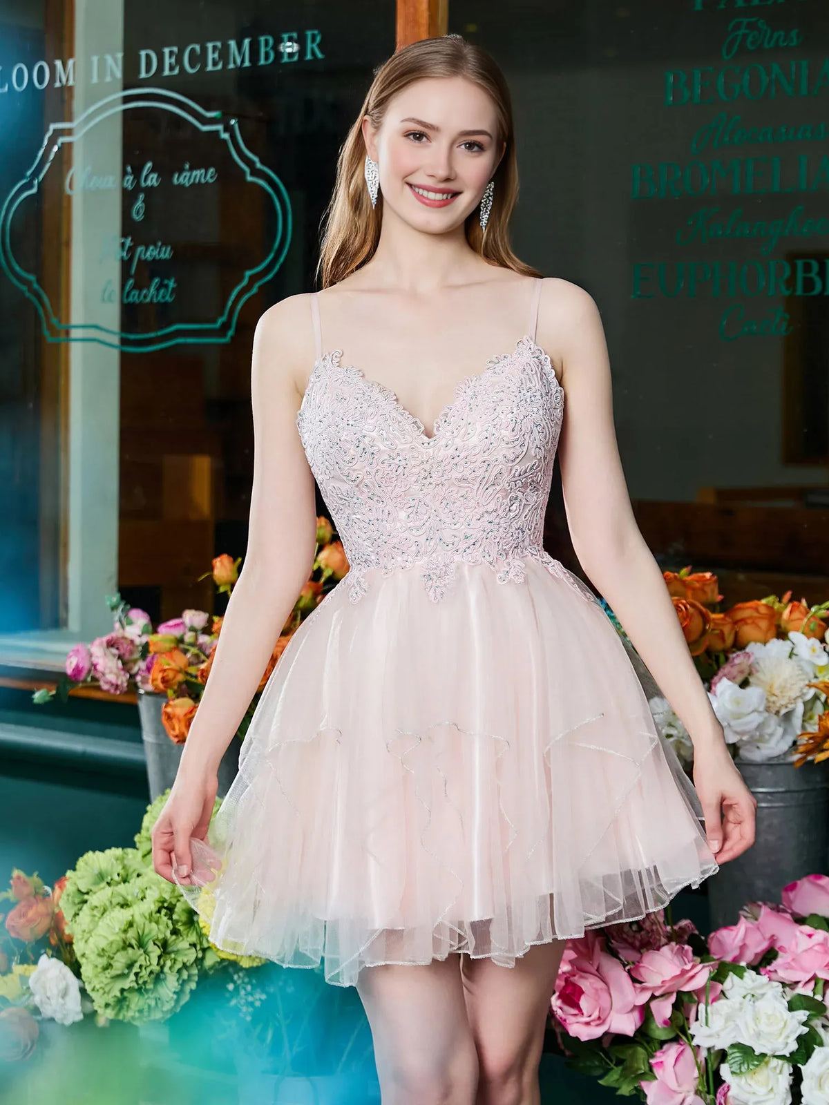 Blush Pink short homecoming dress, alternate view showing the dress shape and hem