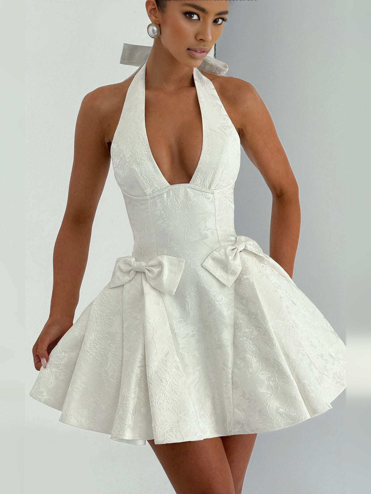 Ivory white mini homecoming dress, alternate view showing the dress shape and hem