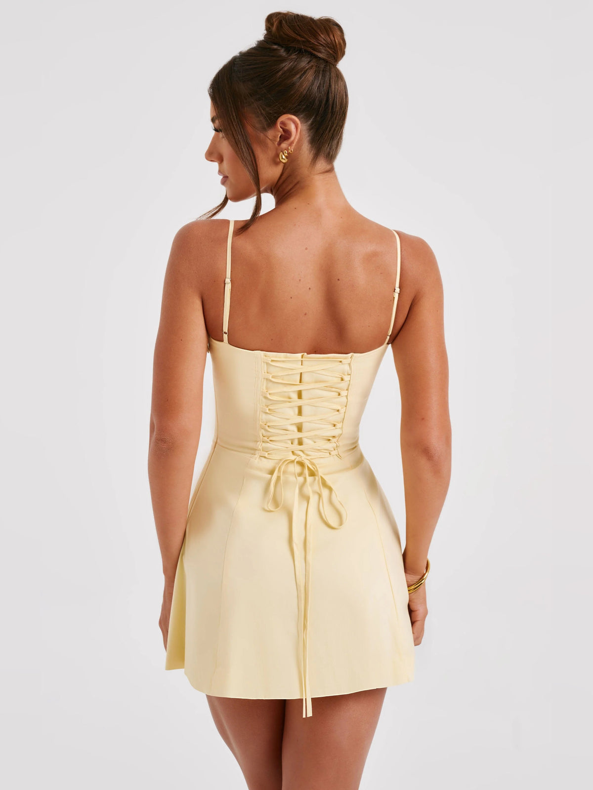 Lemon mini homecoming dress, alternate view showing the dress shape and hem