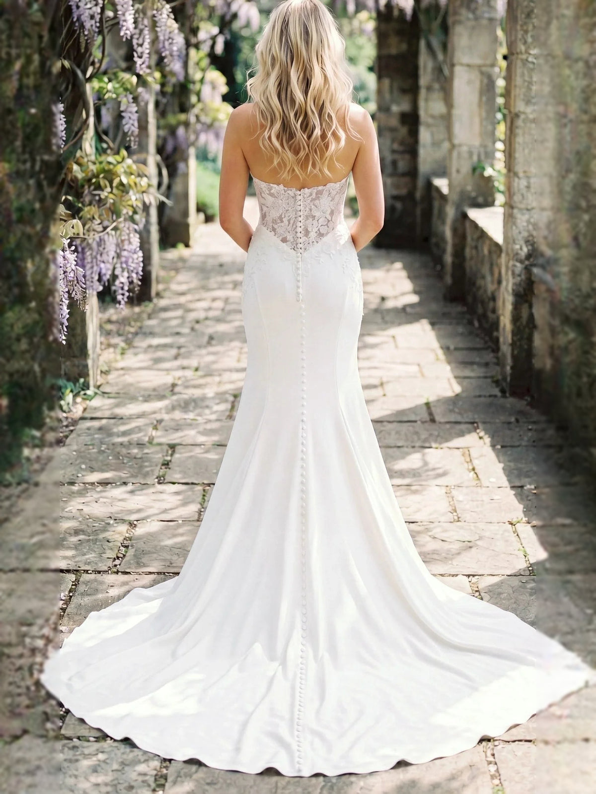 Ivory floor-length wedding dress, alternate view showing the dress shape and hem
