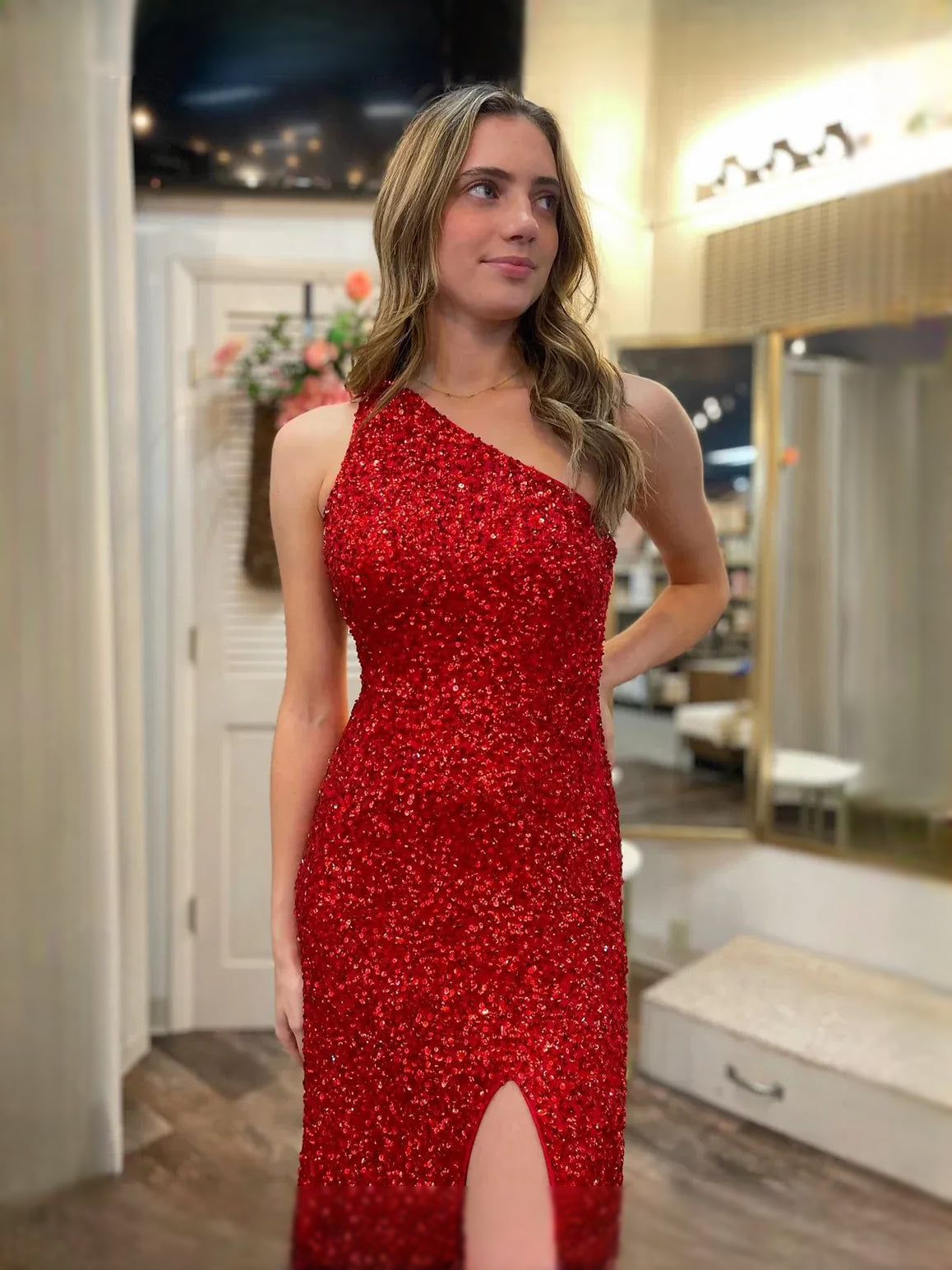 Red floor-length prom dress, alternate view showing the dress shape and hem