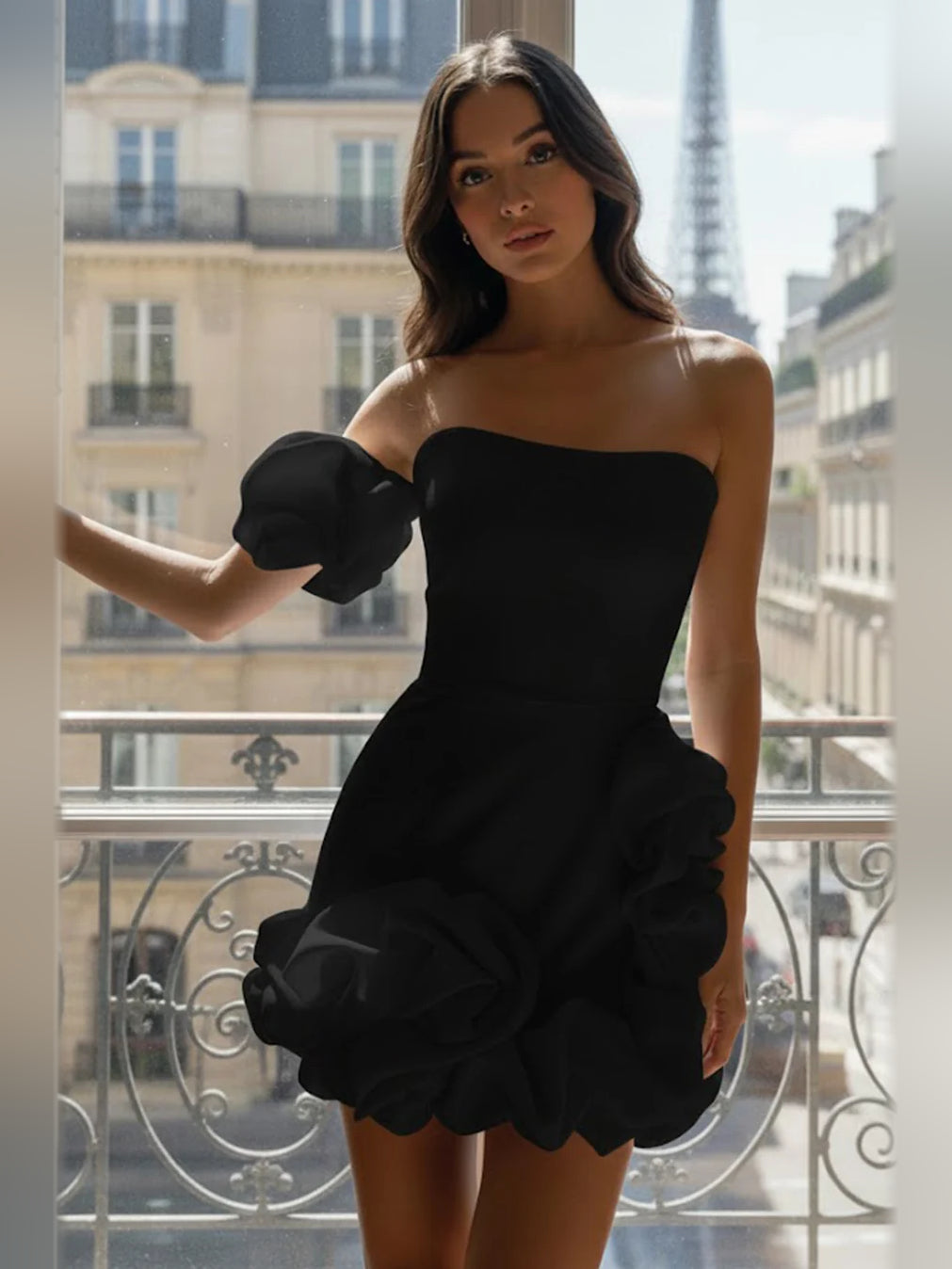 Black mini homecoming dress, alternate view showing the dress shape and hem
