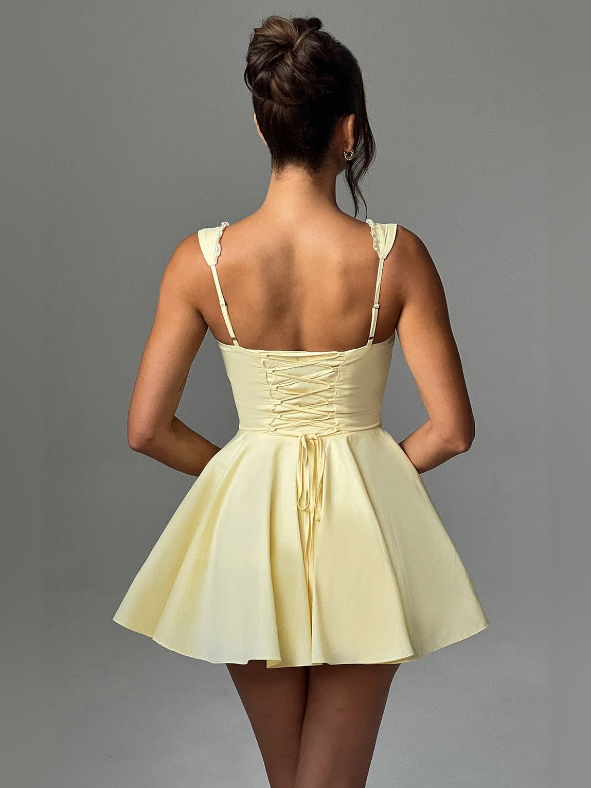 Lemon mini homecoming dress, alternate view showing the dress shape and hem