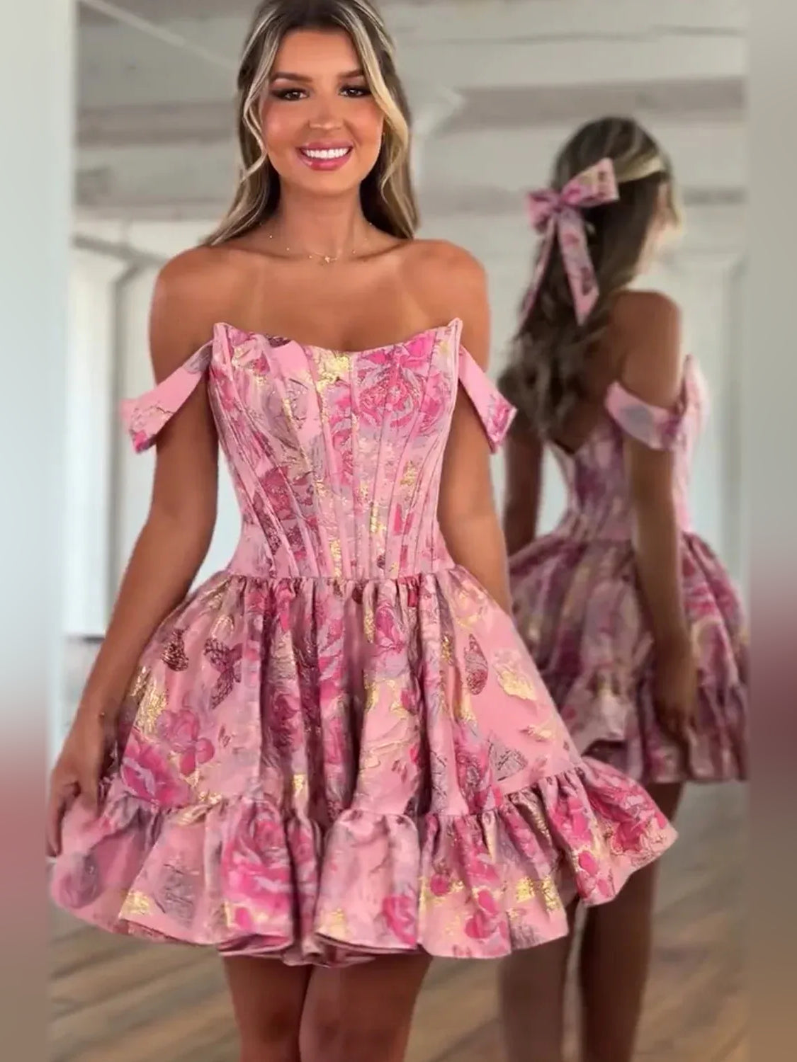 Floral mini homecoming dress, alternate view showing the dress shape and hem