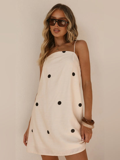 Cream mini homecoming dress, alternate view showing the dress shape and hem