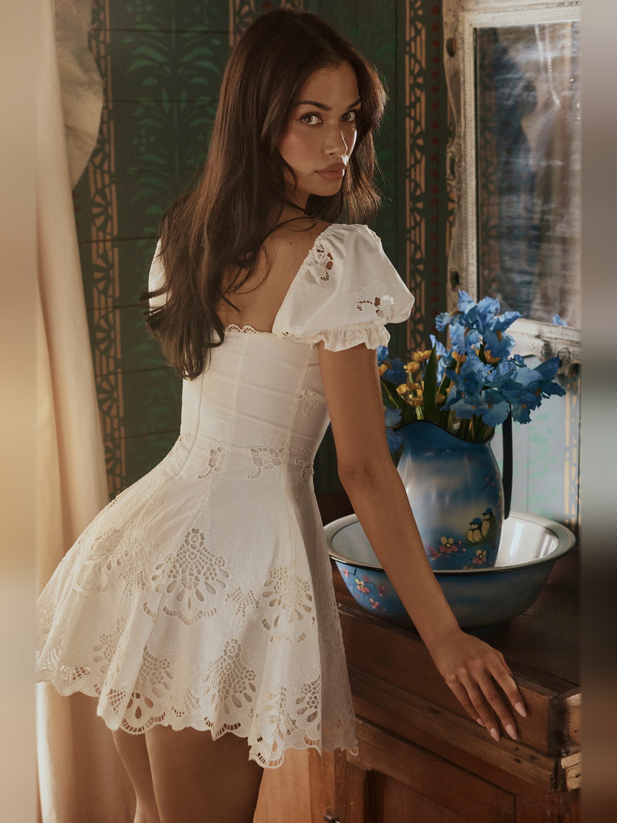 White mini homecoming dress, alternate view showing the dress shape and hem