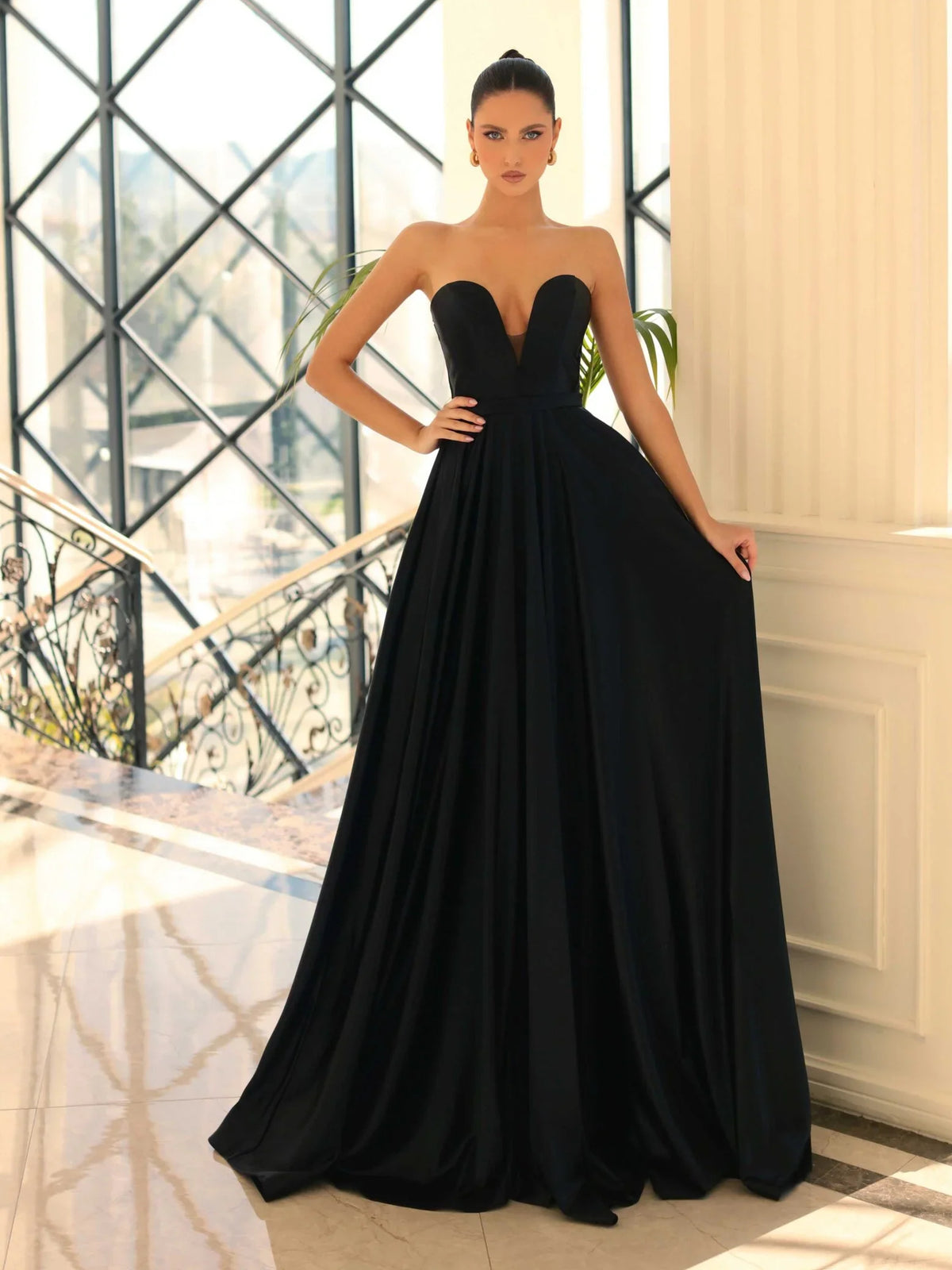 Black maxi prom dress, alternate view showing the dress shape and hem