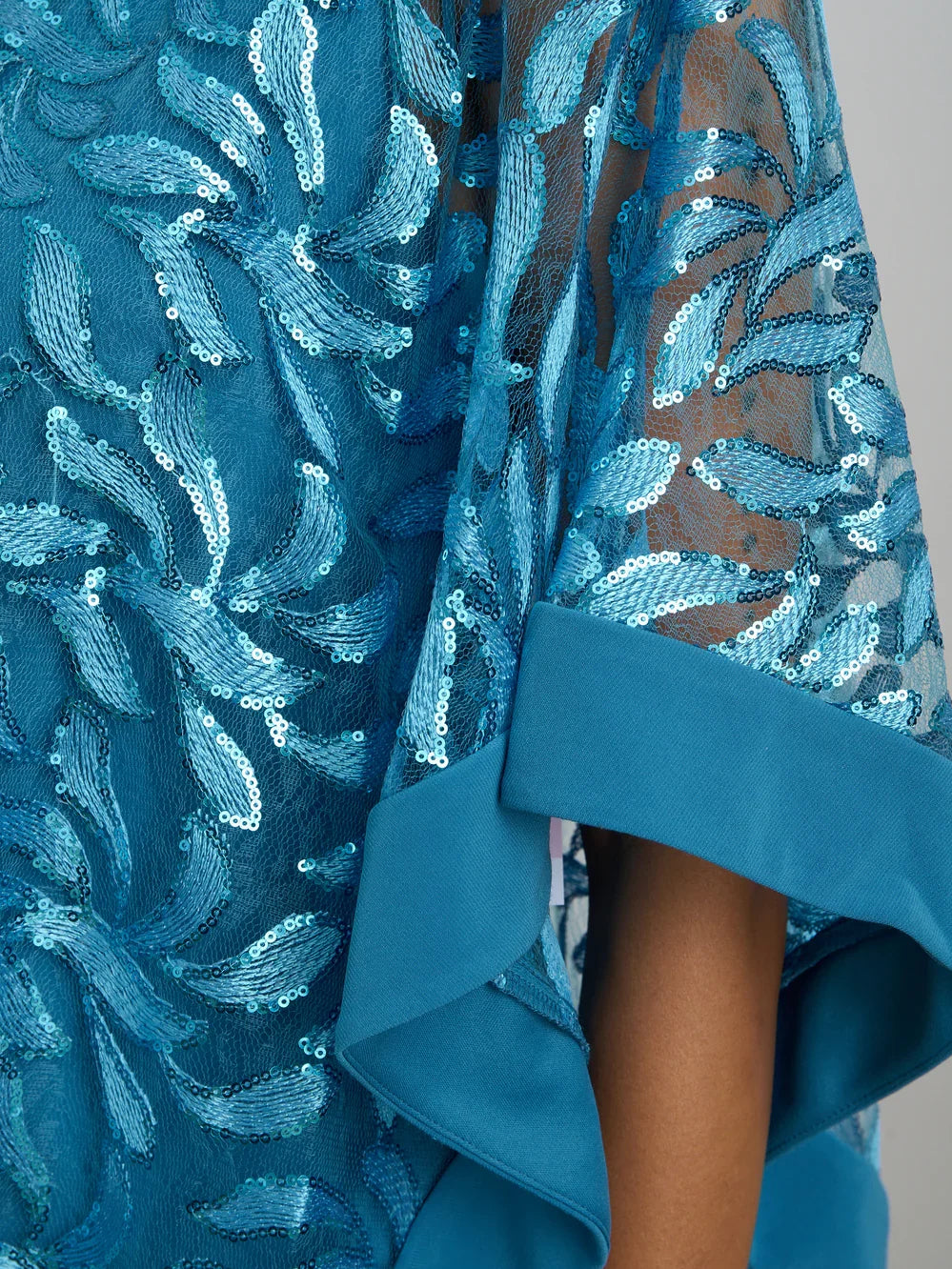 Turquoise knee-length mother of the bride dress, alternate view showing the dress shape and hem
