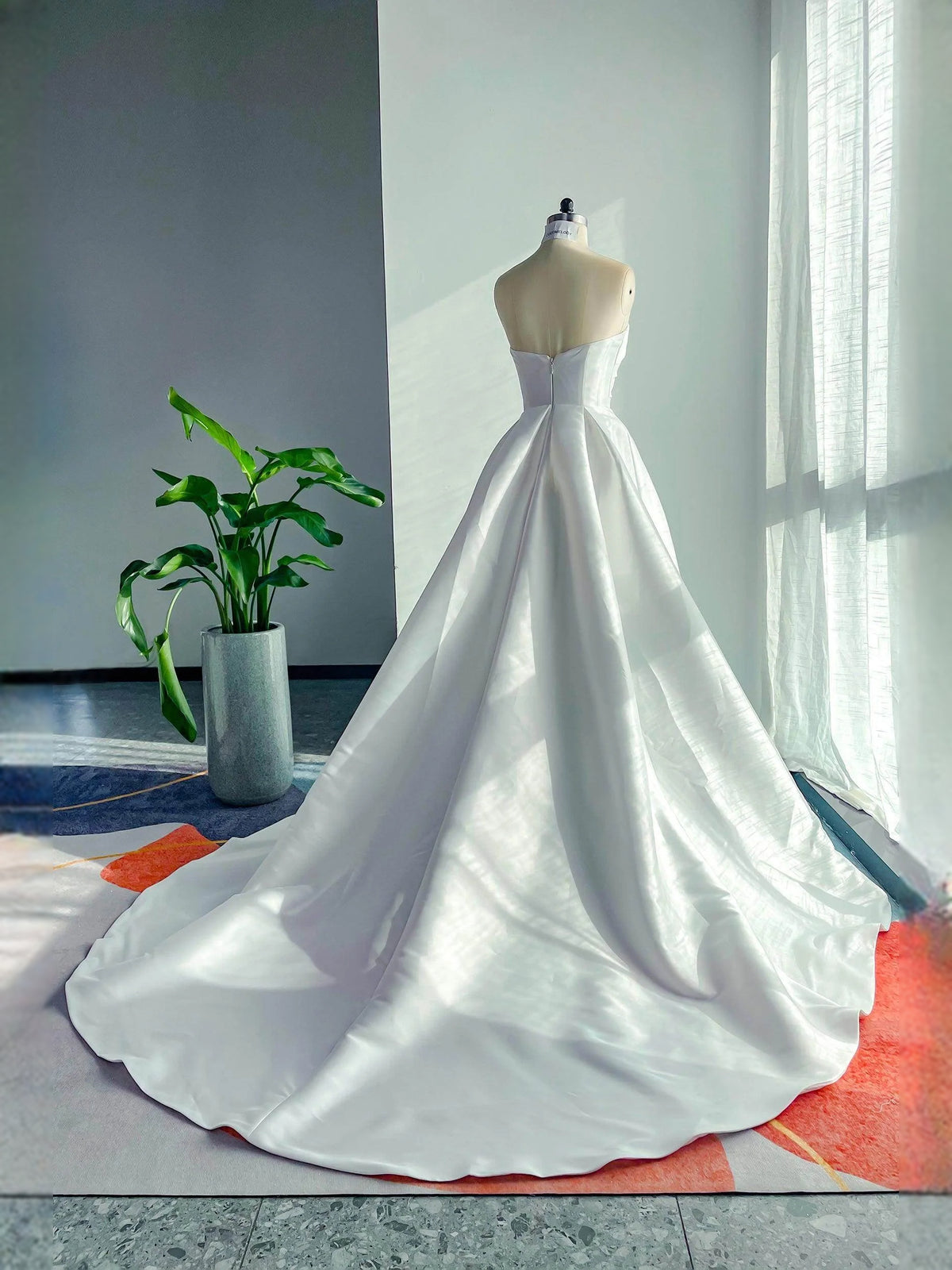 White floor-length wedding dress, alternate view showing the dress shape and hem