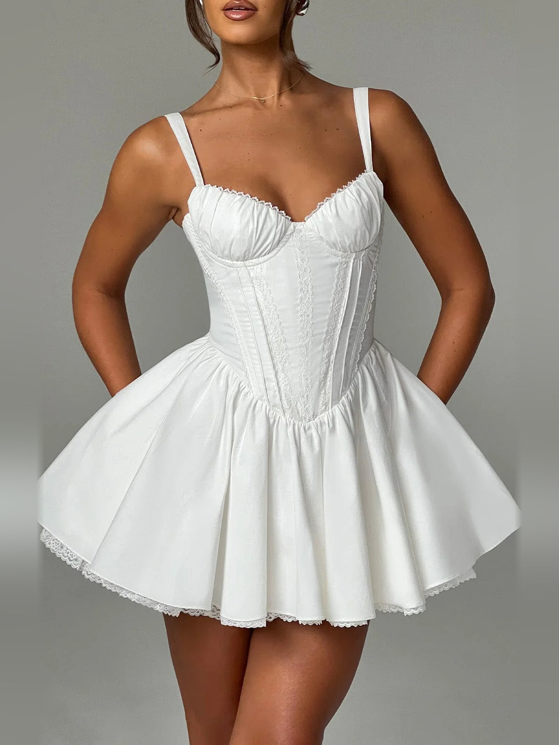 White mini homecoming dress, alternate view showing the dress shape and hem