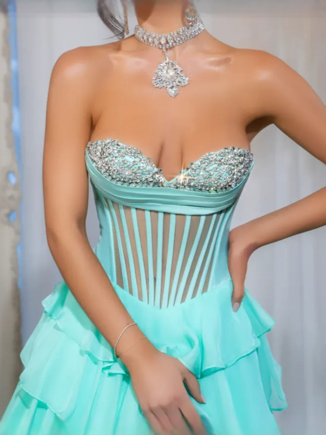 Turquoise floor-length prom dress, alternate view showing the dress shape and hem