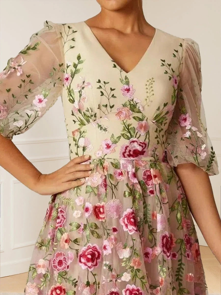 Champagne maxi mother of the bride dress, alternate view showing the dress shape and hem