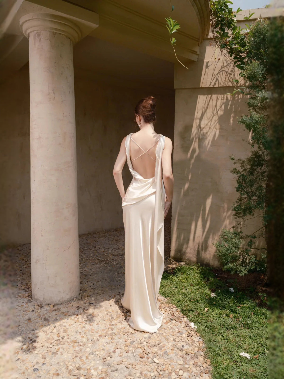 Ivory floor-length wedding dress, alternate view showing the dress shape and hem