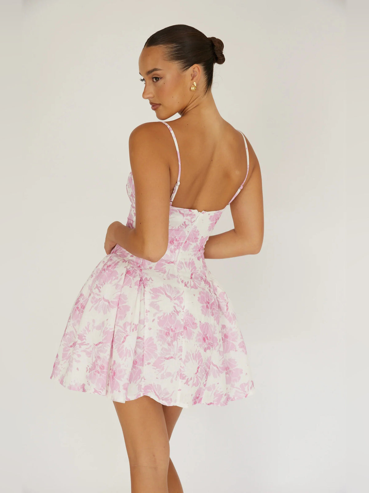 Pink mini homecoming dress, alternate view showing the dress shape and hem