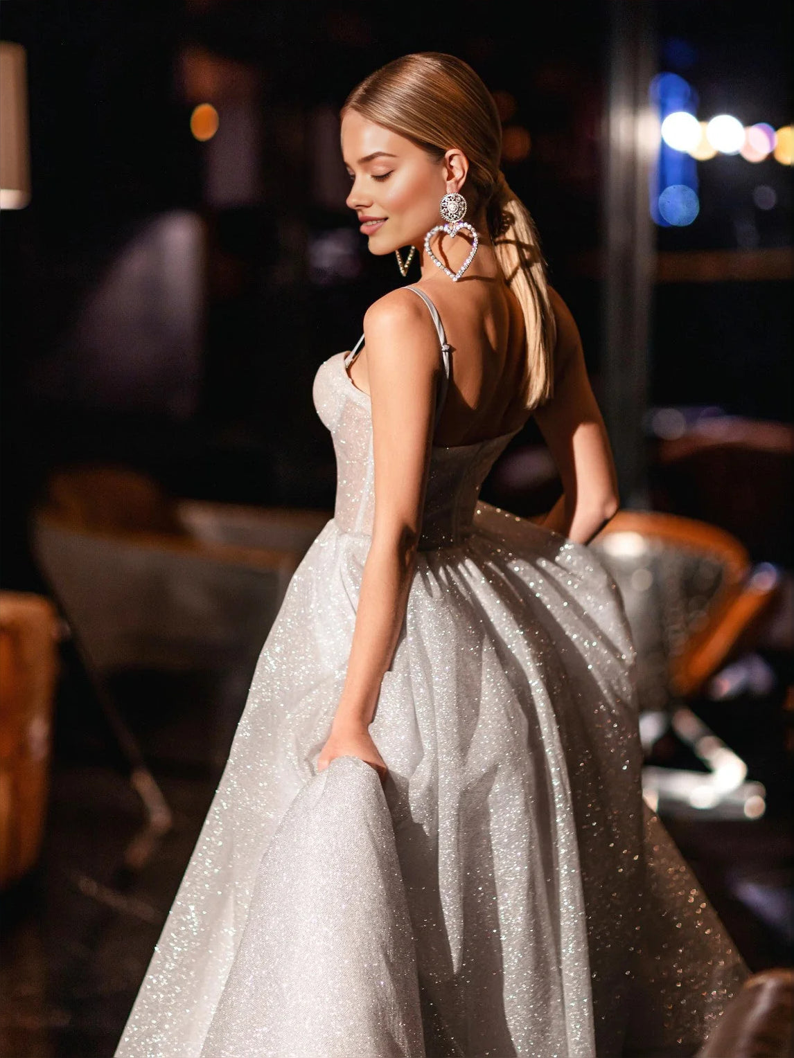 Silver floor-length prom dress, alternate view showing the dress shape and hem