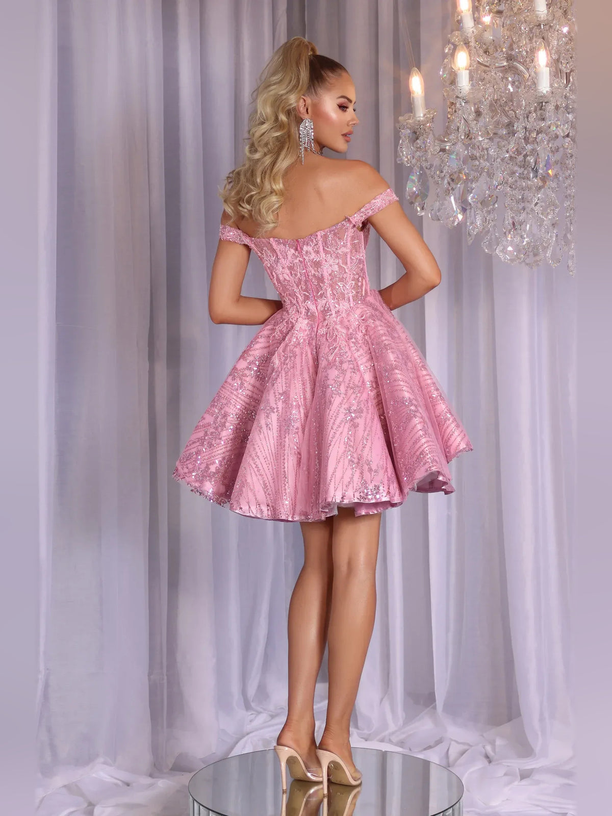 Pink mini homecoming dress, alternate view showing the dress shape and hem