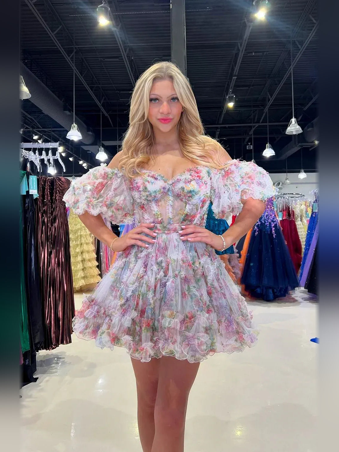 Floral mini homecoming dress, alternate view showing the dress shape and hem