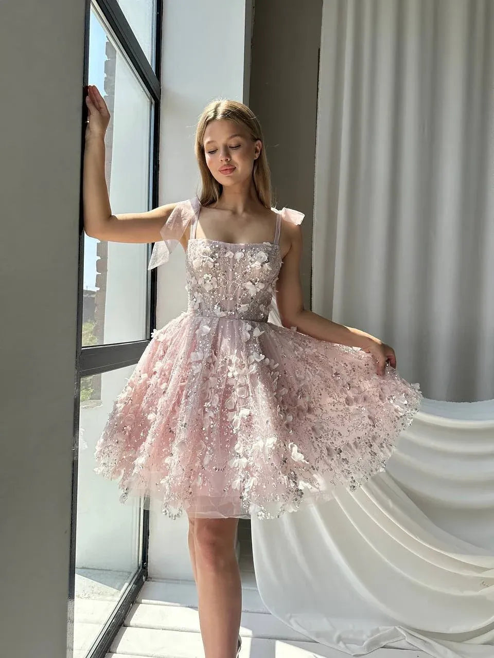 Blush Pink mini homecoming dress, alternate view showing the dress shape and hem
