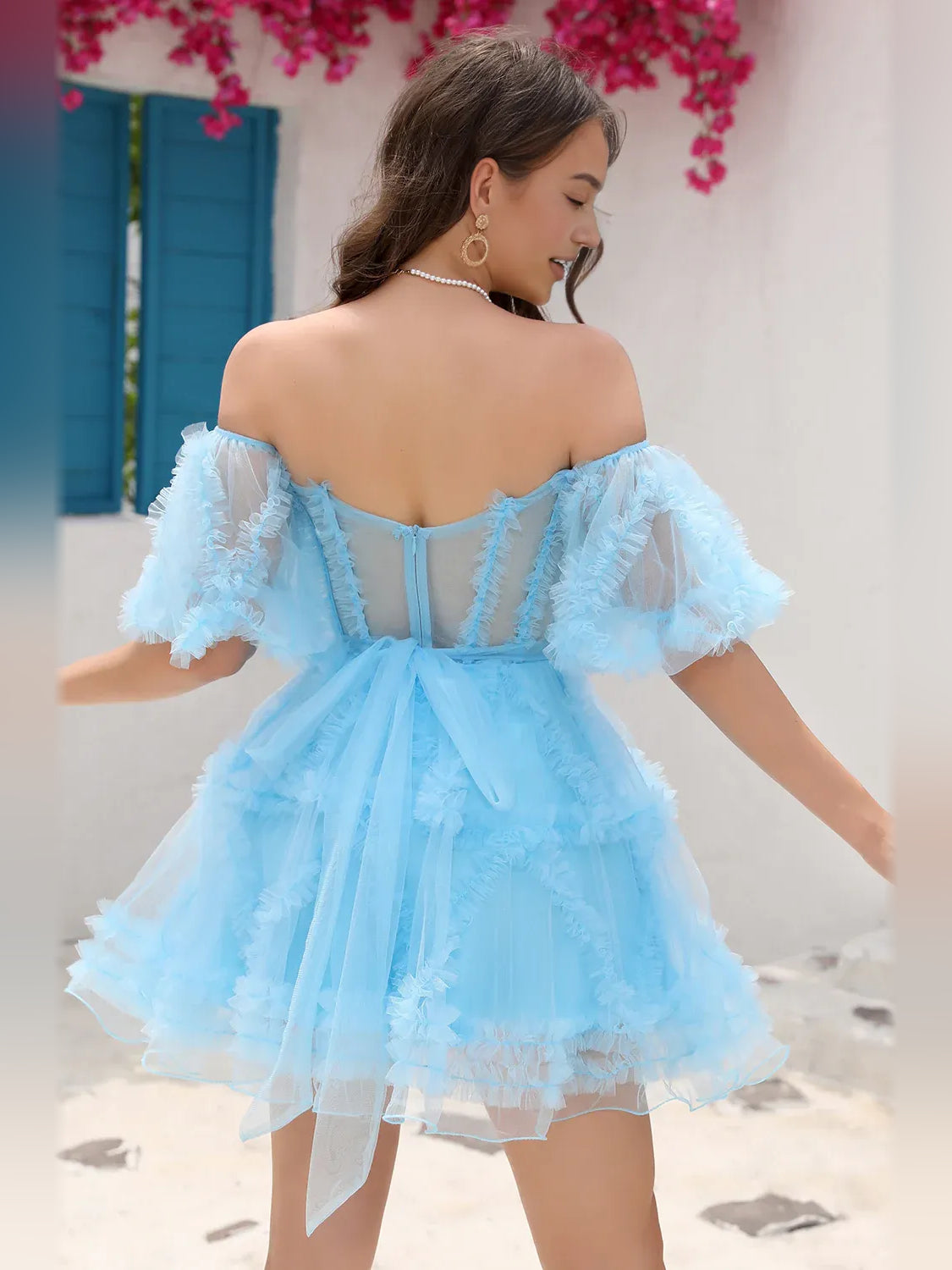 Pink mini homecoming dress, alternate view showing the dress shape and hem