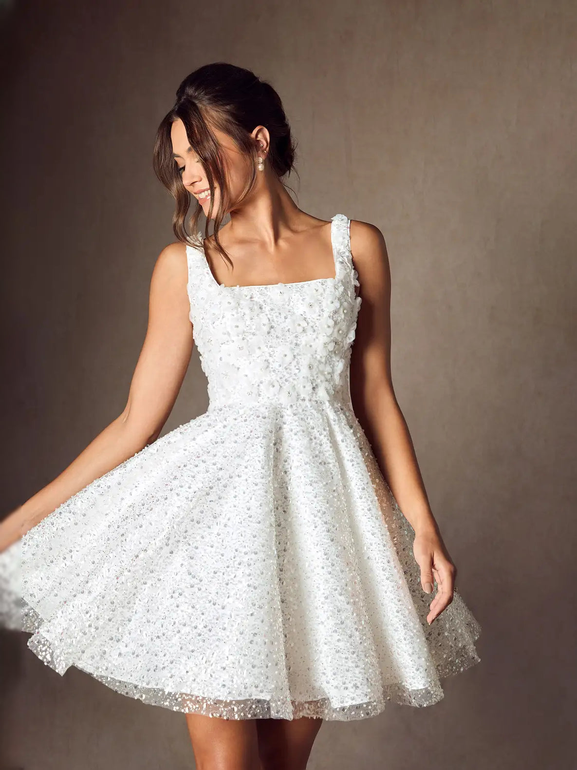 White mini wedding dress, alternate view showing the dress shape and hem