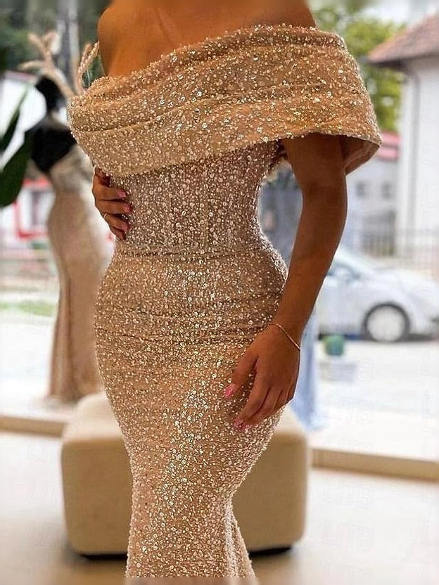 Gold maxi prom dress, alternate view showing the dress shape and hem