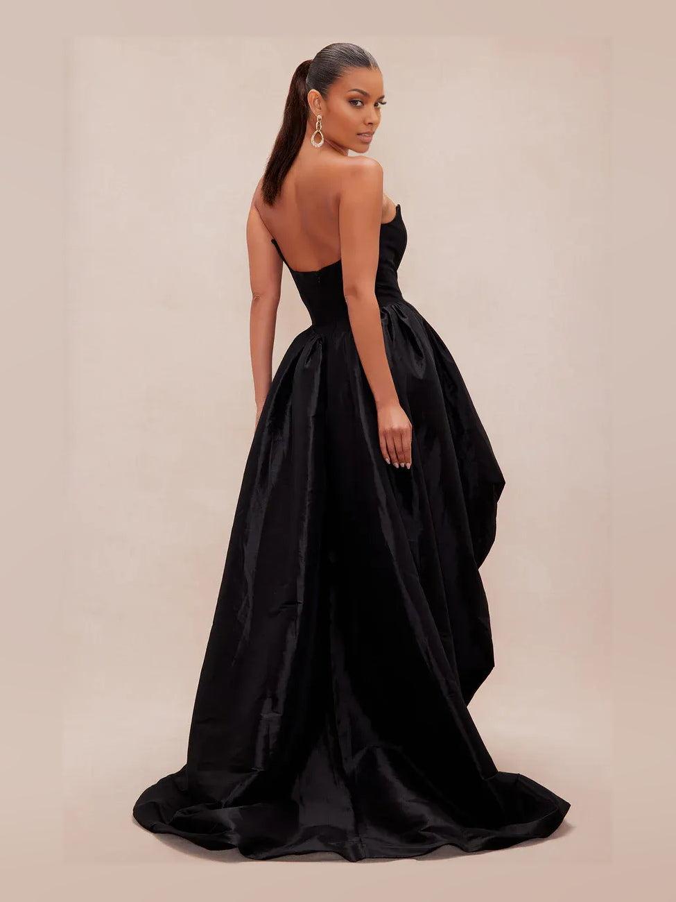 Black high-low prom dress, alternate view showing the dress shape and hem