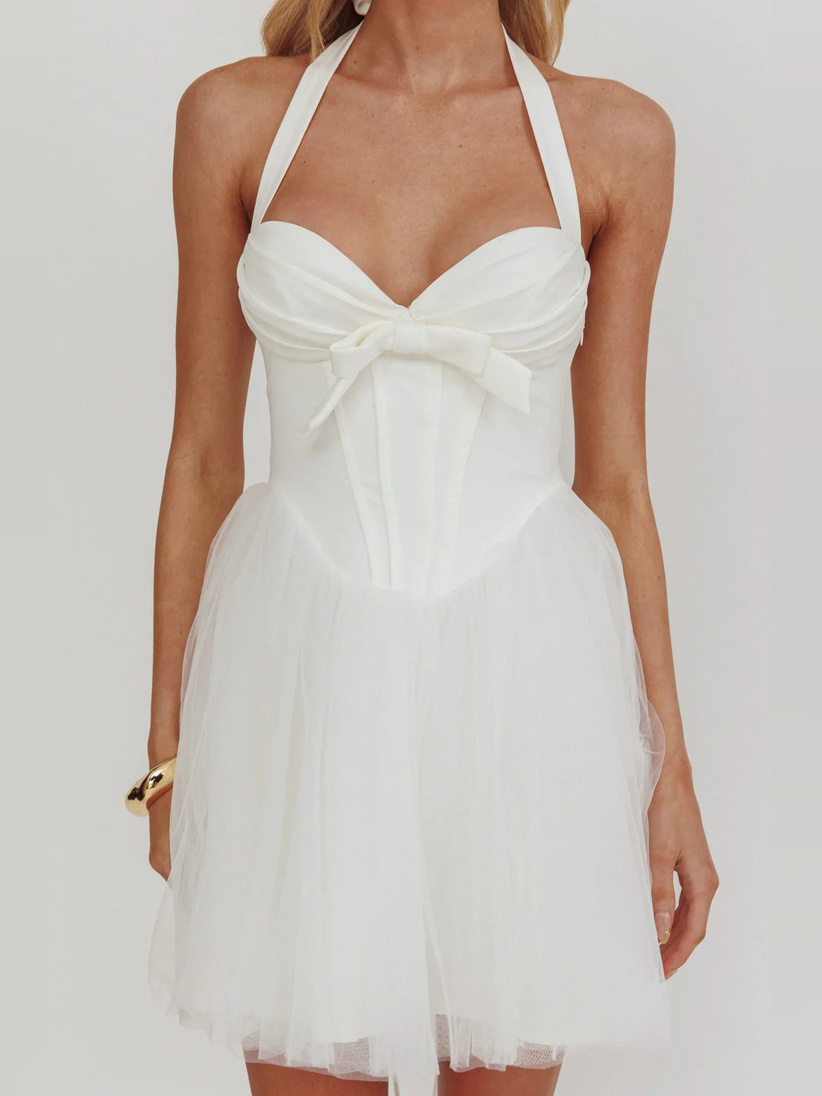 White mini homecoming dress, alternate view showing the dress shape and hem