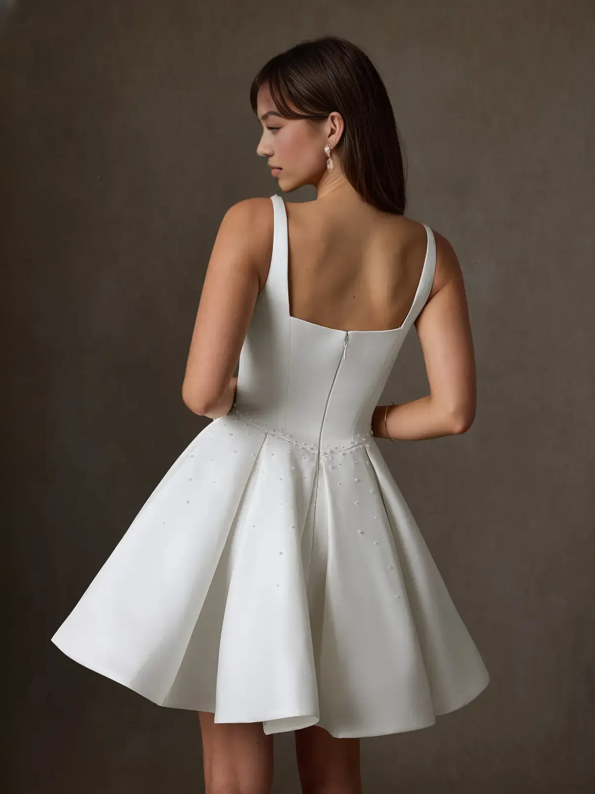 White mini wedding dress, alternate view showing the dress shape and hem