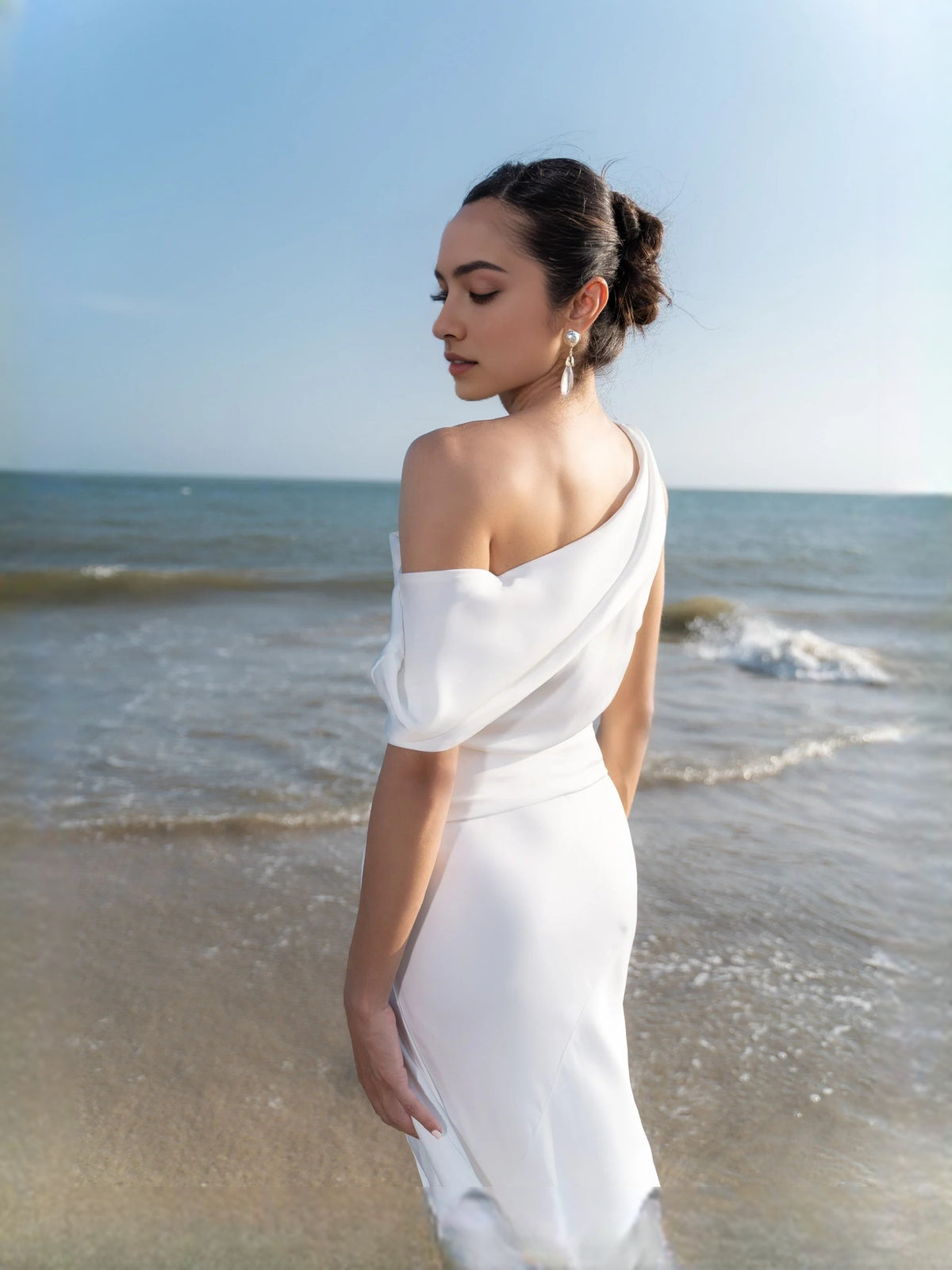 Ivory floor-length wedding dress, alternate view showing the dress shape and hem