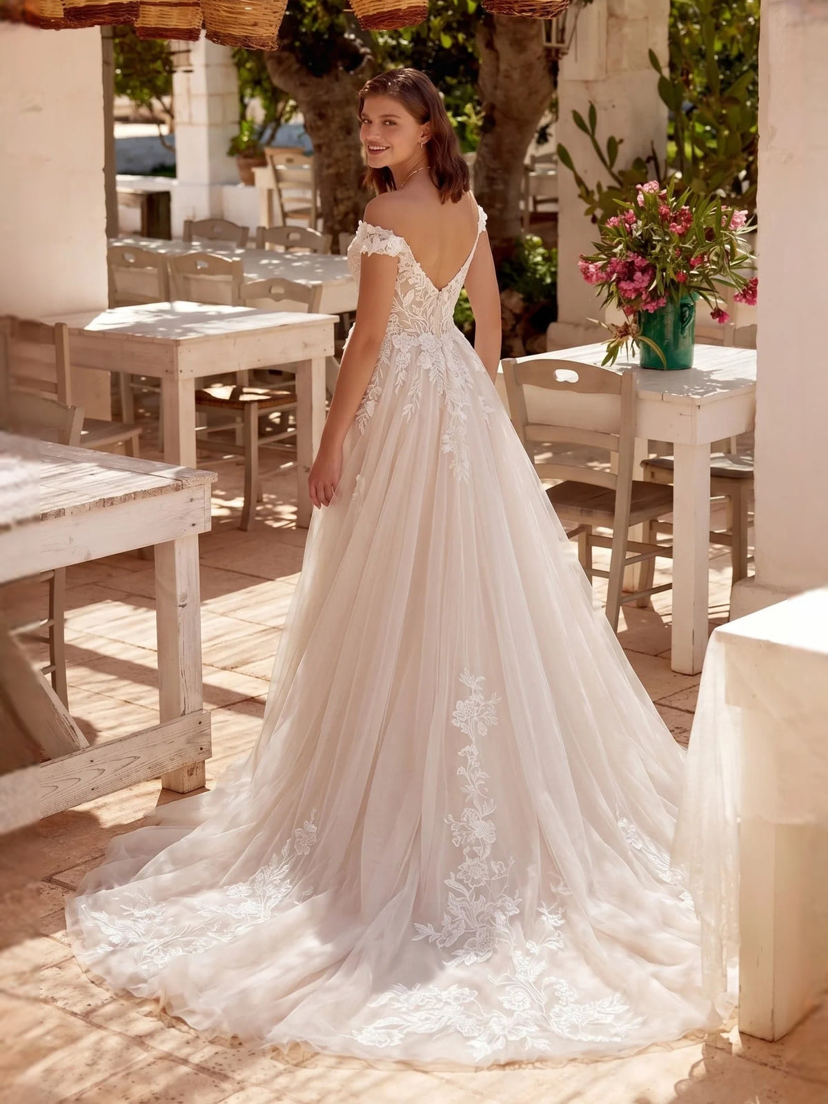 Ivory floor-length wedding dress, alternate view showing the dress shape and hem