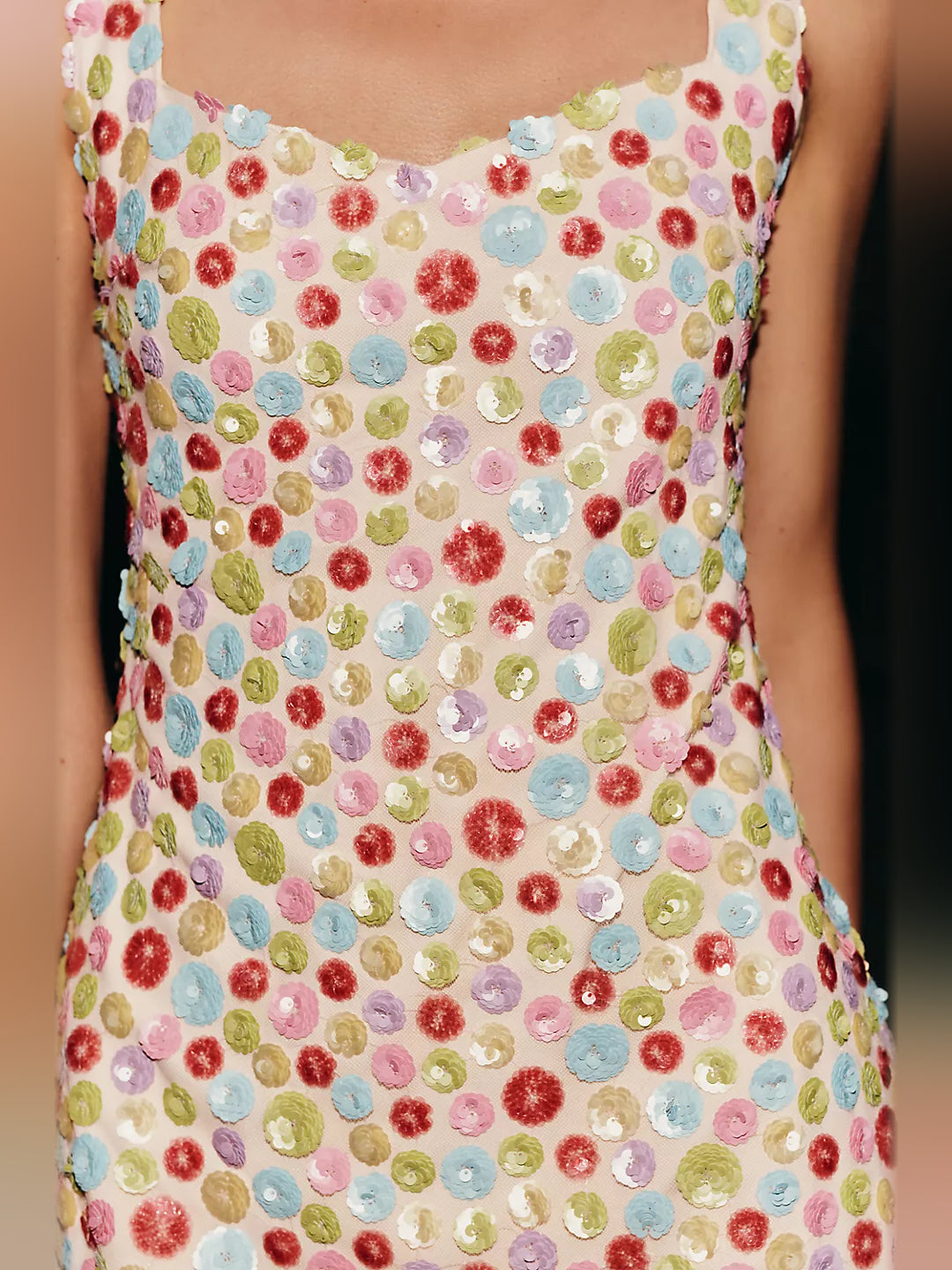 Orange mini homecoming dress, alternate view showing the dress shape and hem