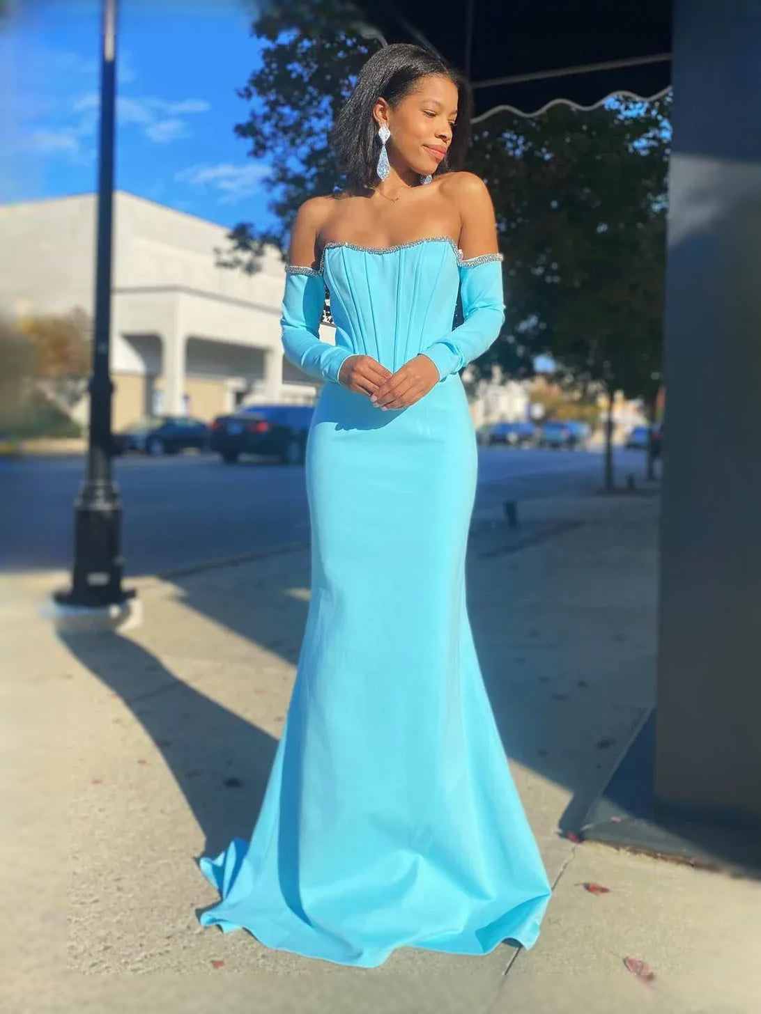 Light Blue maxi prom dress, back view showing the rear of the dress from another angle