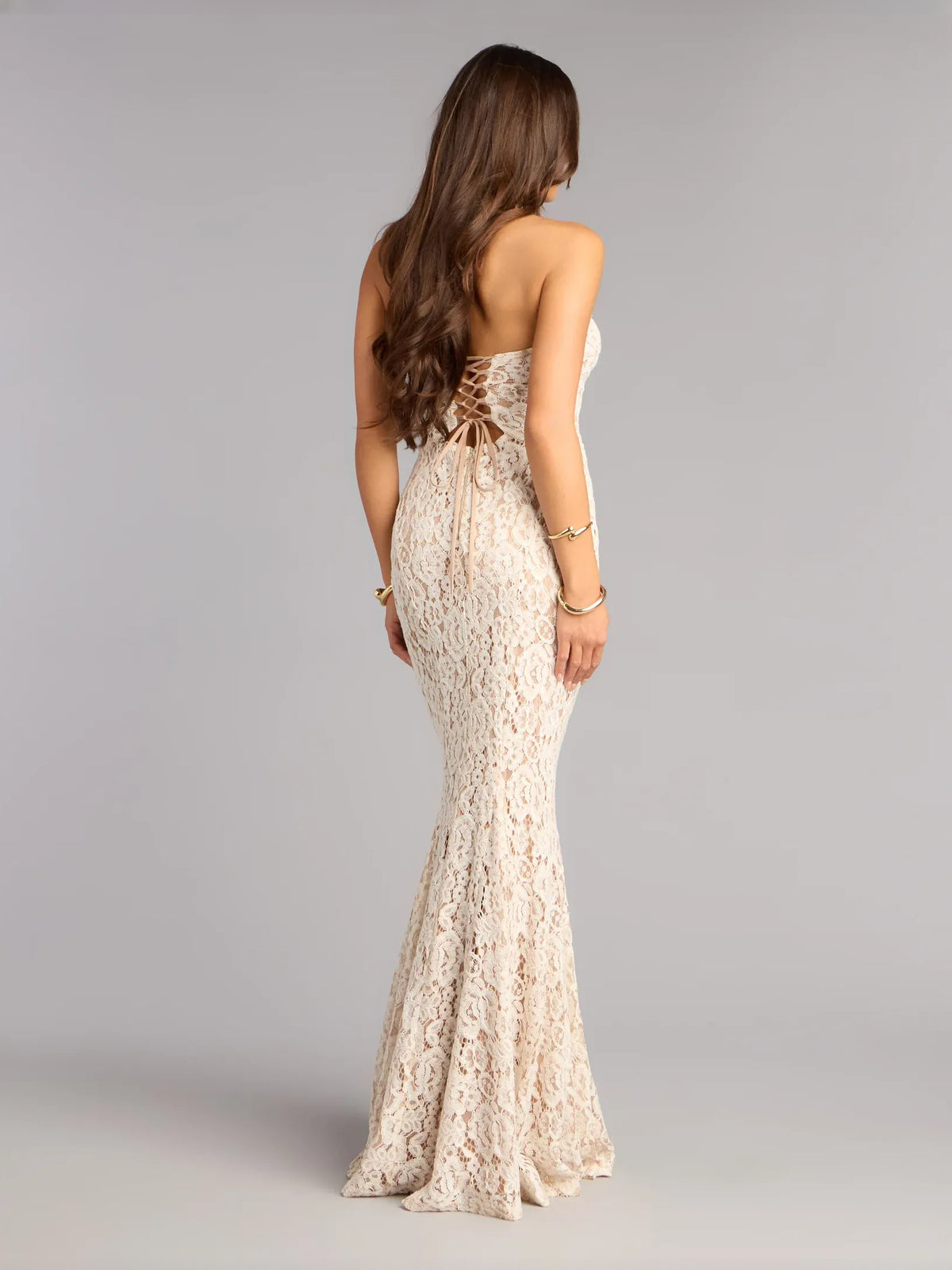 Ivory maxi prom dress, back view showing the rear of the dress from another angle