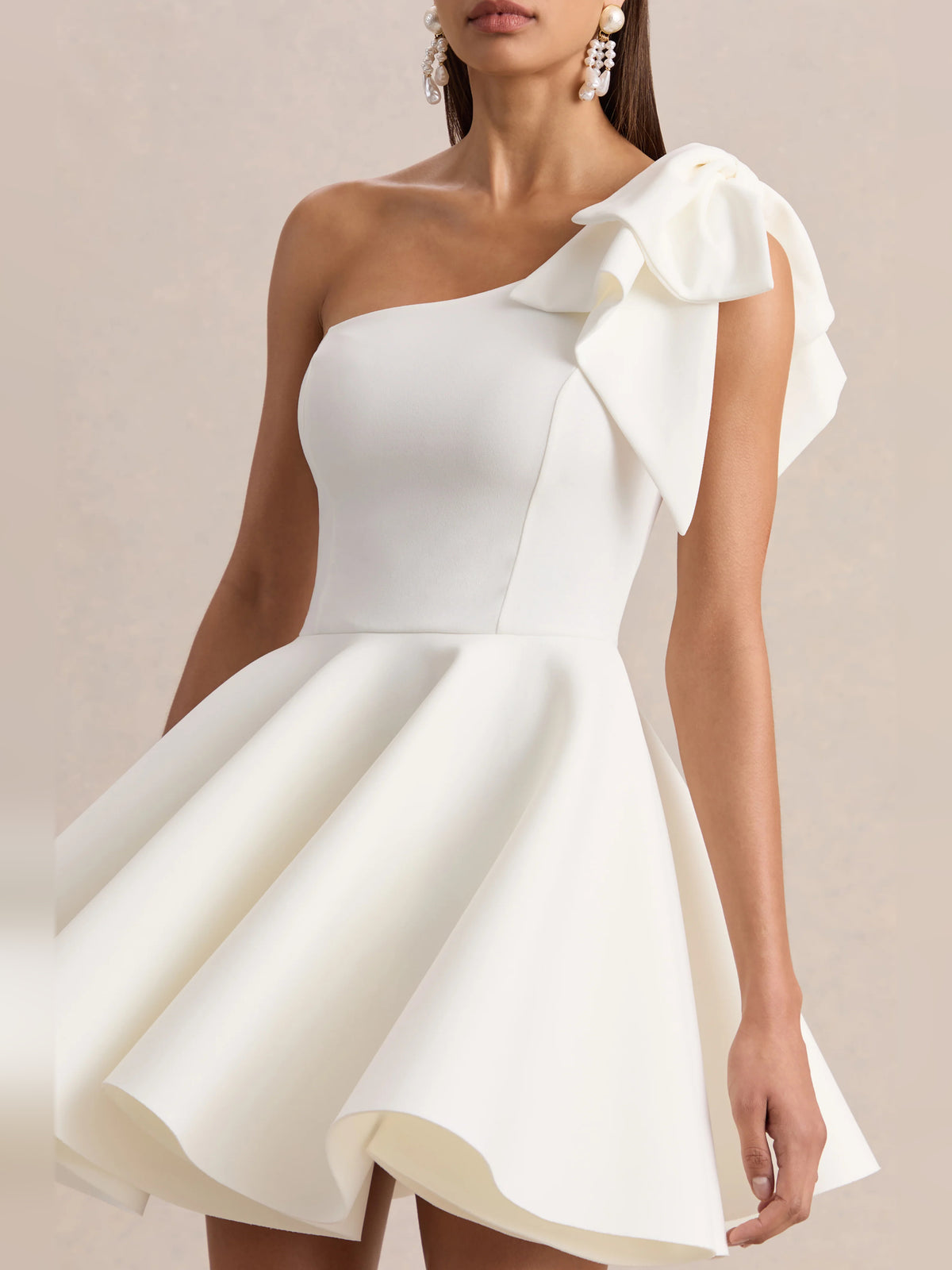 White mini homecoming dress, alternate view showing the dress shape and hem