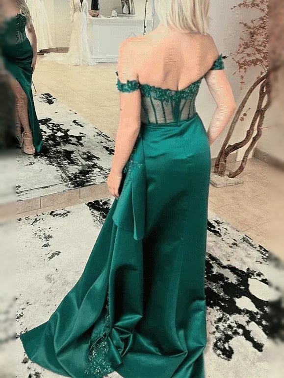Emerald Green maxi prom dress, back view showing the rear of the dress from another angle