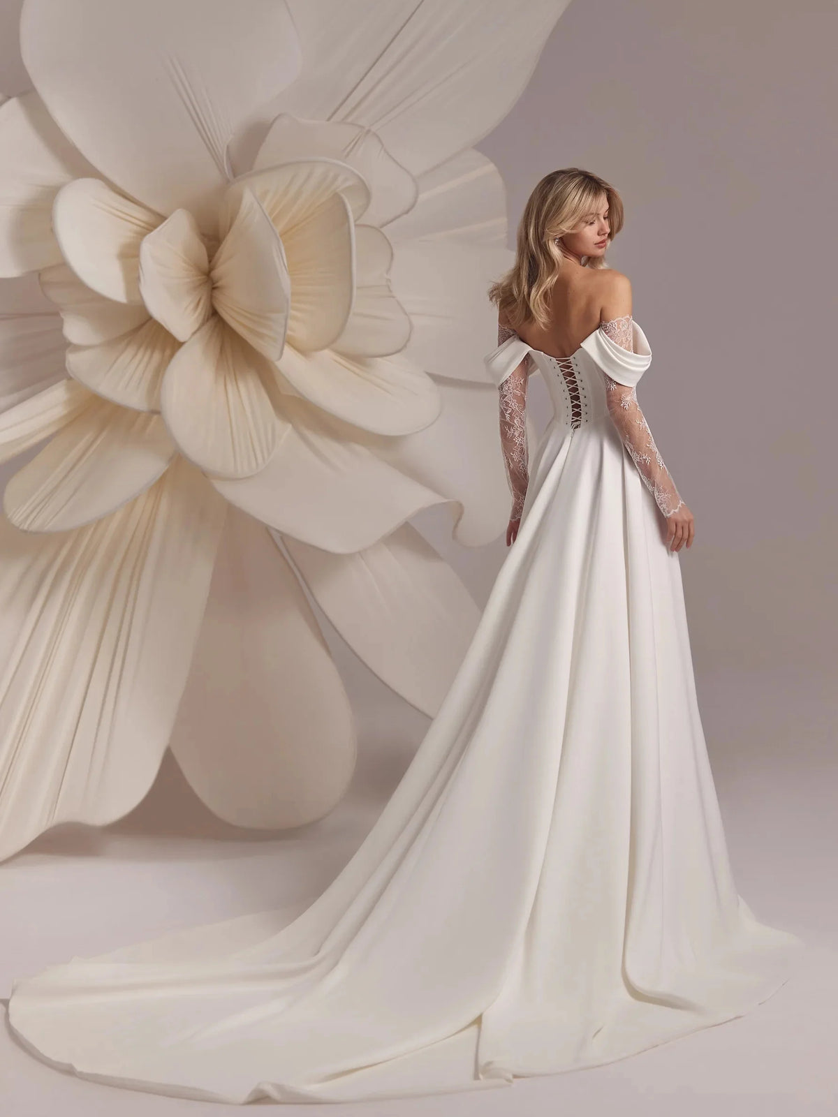 Ivory floor-length wedding dress, alternate view showing the dress shape and hem