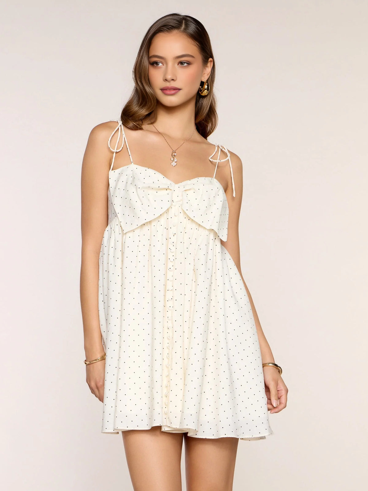 Ivory white mini homecoming dress, alternate view showing the dress shape and hem