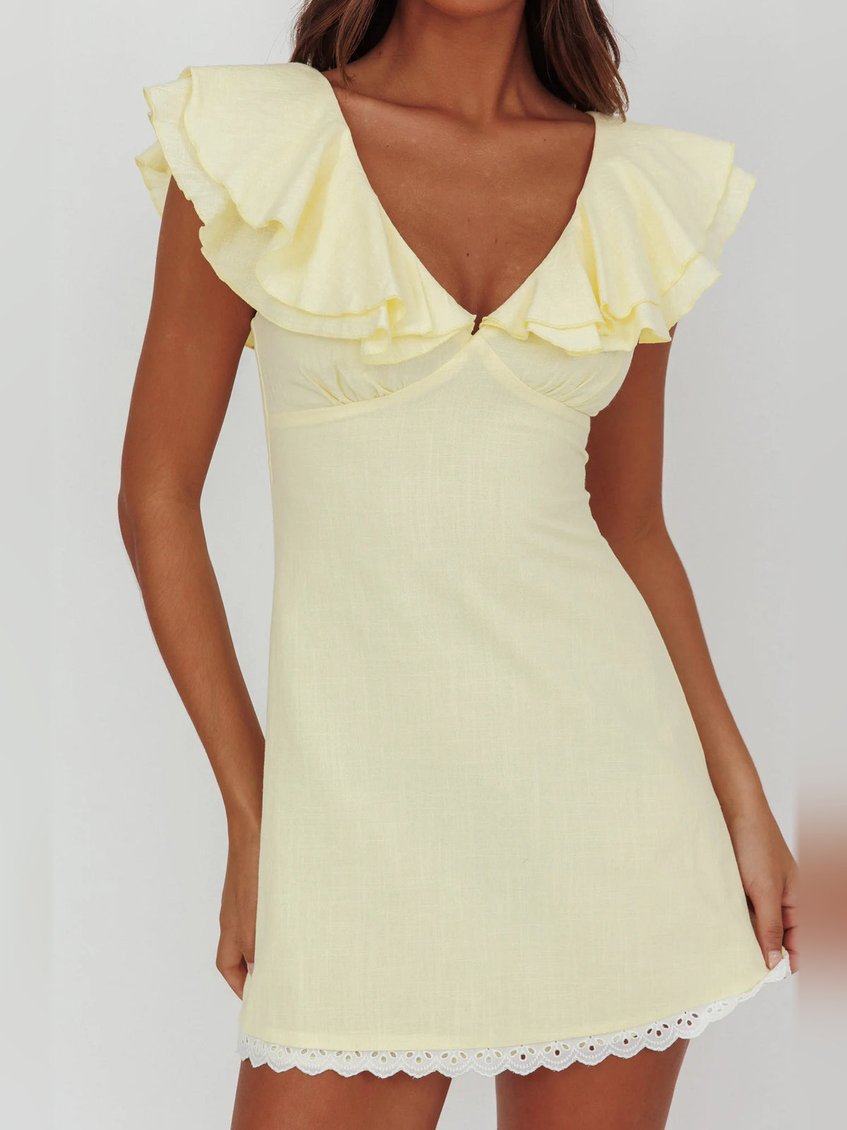 Butter mini homecoming dress, alternate view showing the dress shape and hem