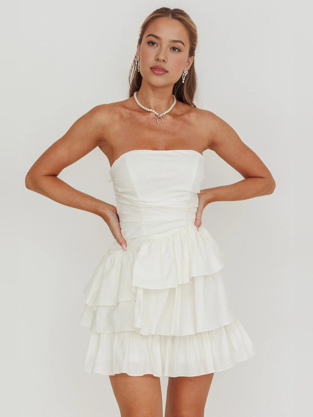 Ivory mini homecoming dress, alternate view showing the dress shape and hem