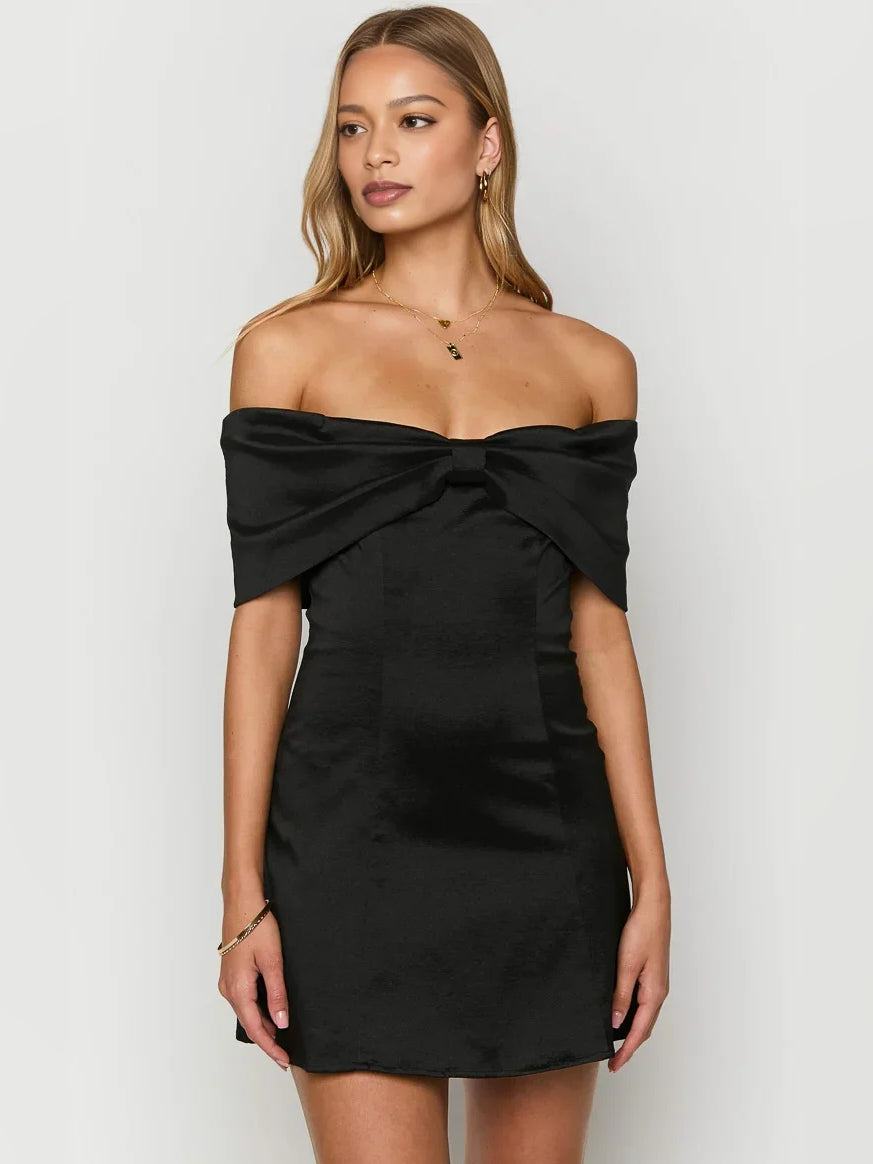 Black mini homecoming dress, alternate view showing the dress shape and hem