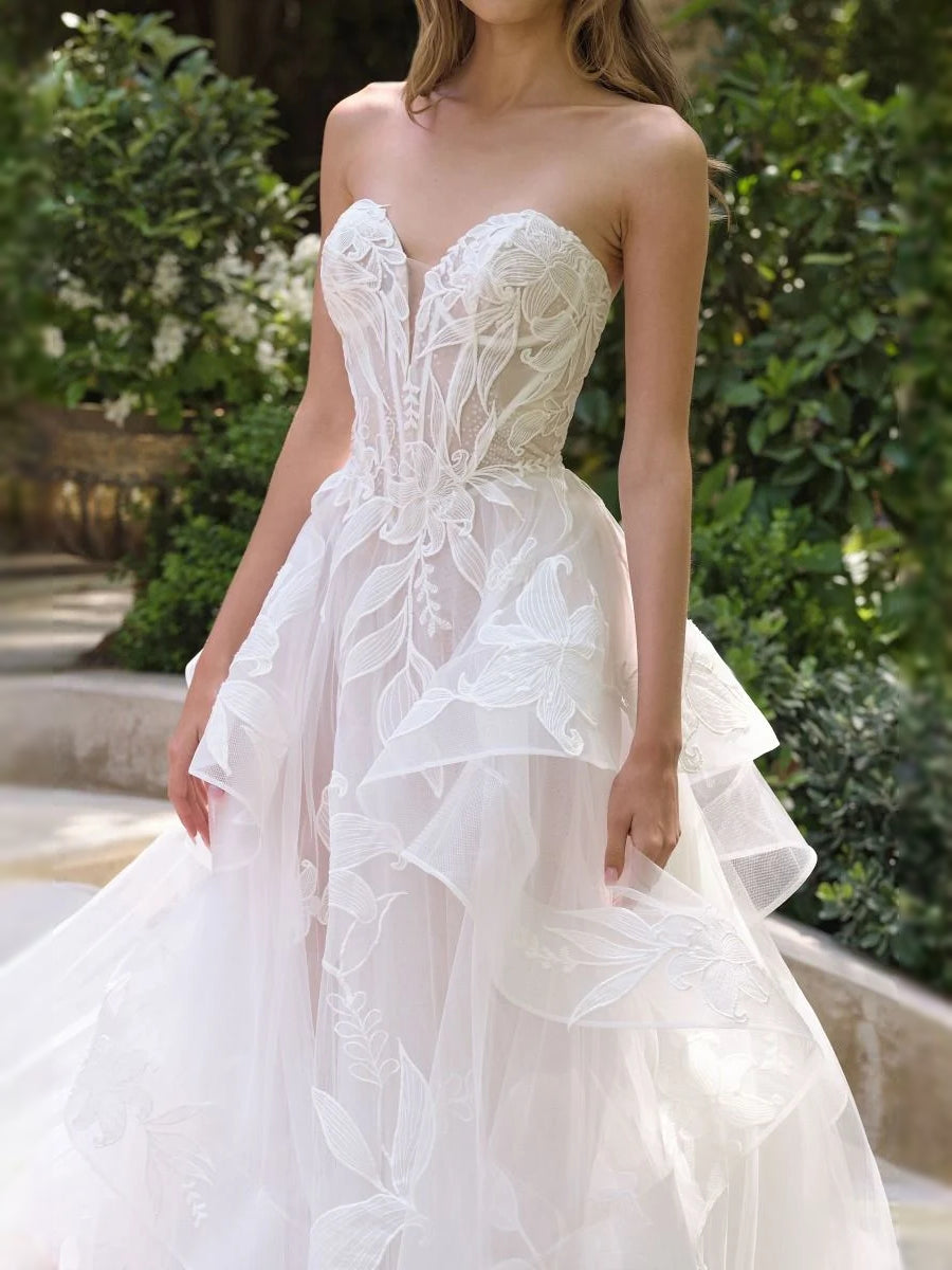 Ivory floor-length wedding dress, alternate view showing the dress shape and hem