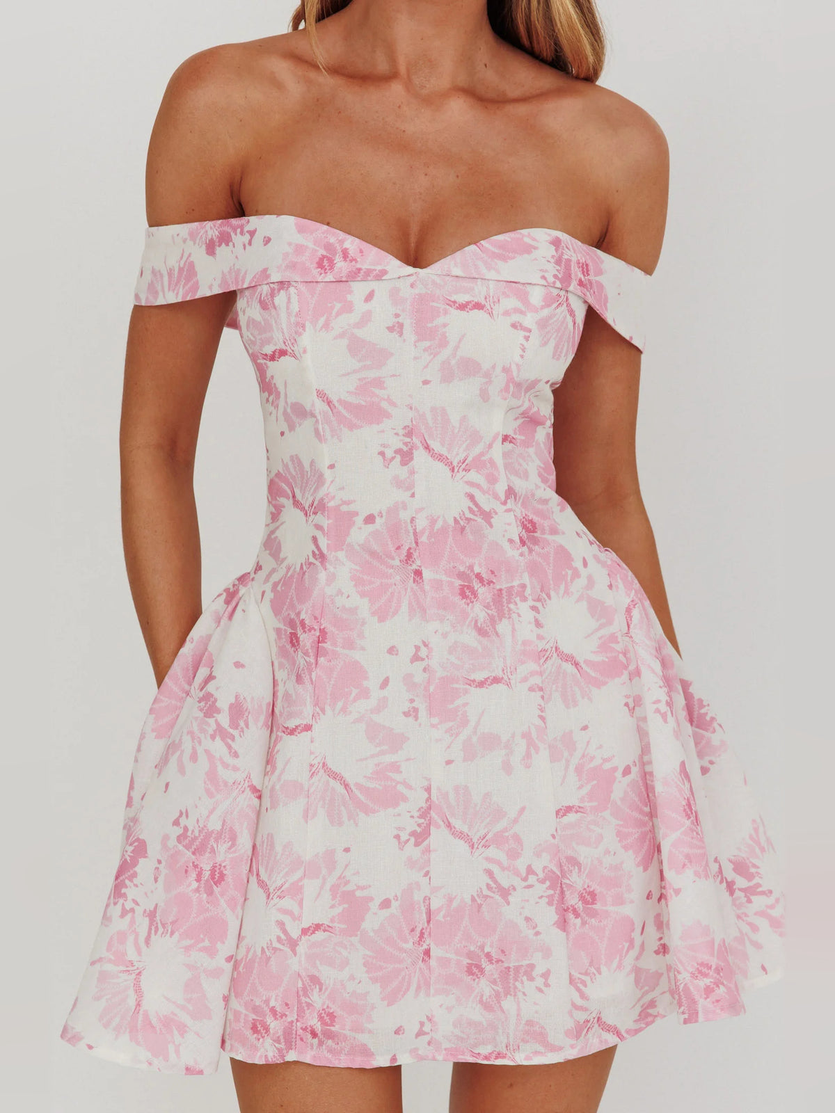 Pink mini homecoming dress, alternate view showing the dress shape and hem