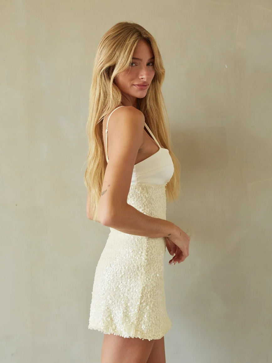 Yellow mini homecoming dress, alternate view showing the dress shape and hem