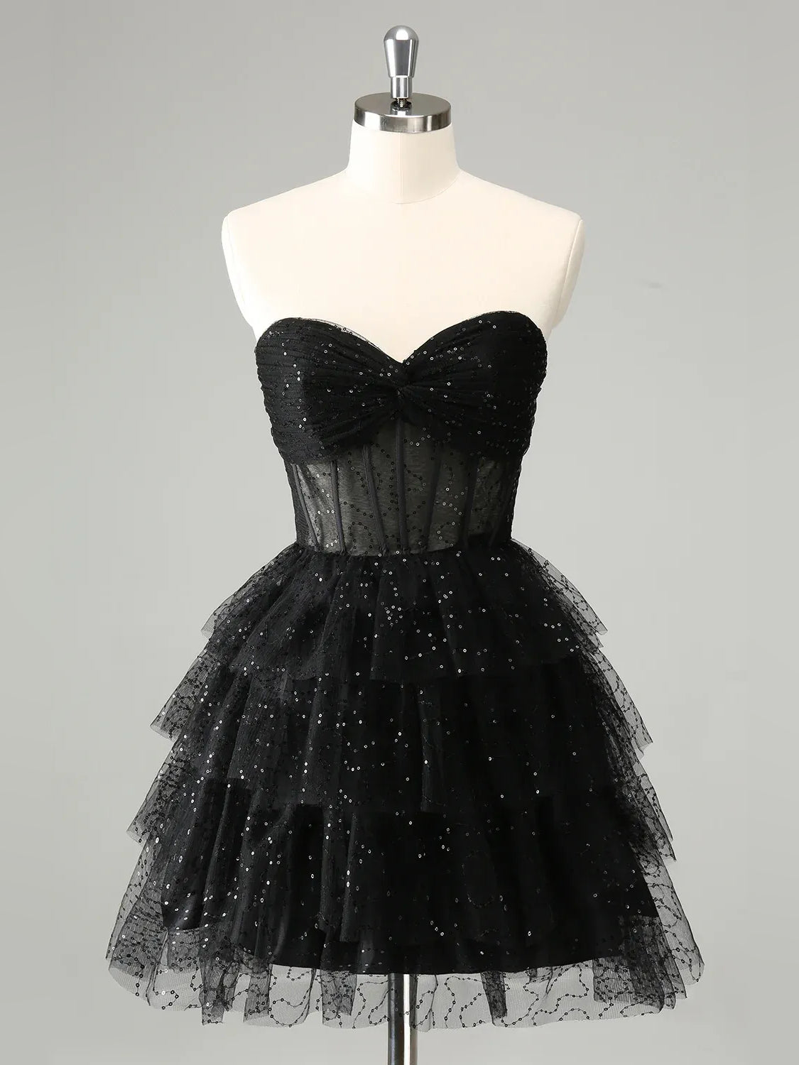 Black mini homecoming dress, alternate view showing the dress shape and hem