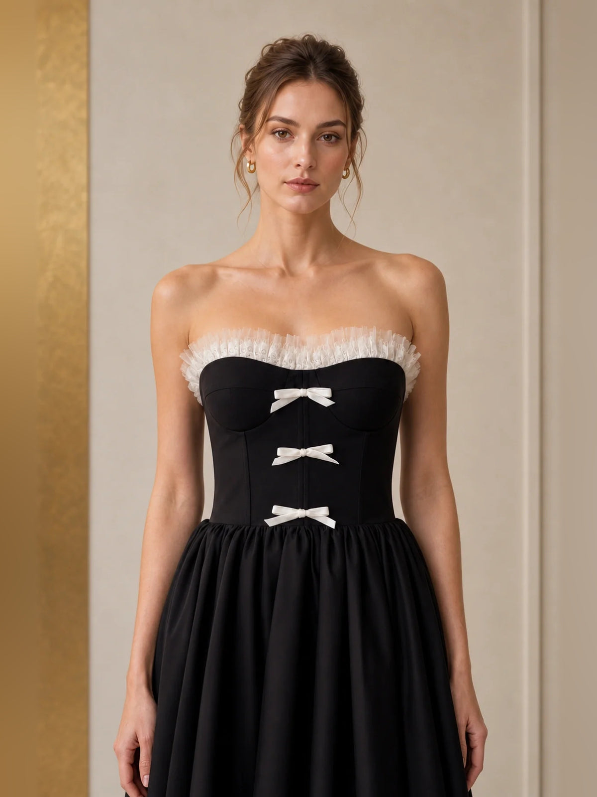 Black tea-length homecoming dress, alternate view showing the dress shape and hem