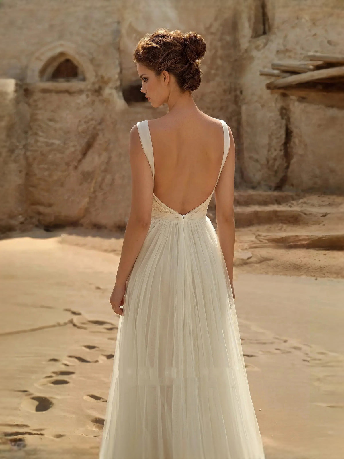 Ivory floor-length wedding dress, alternate view showing the dress shape and hem
