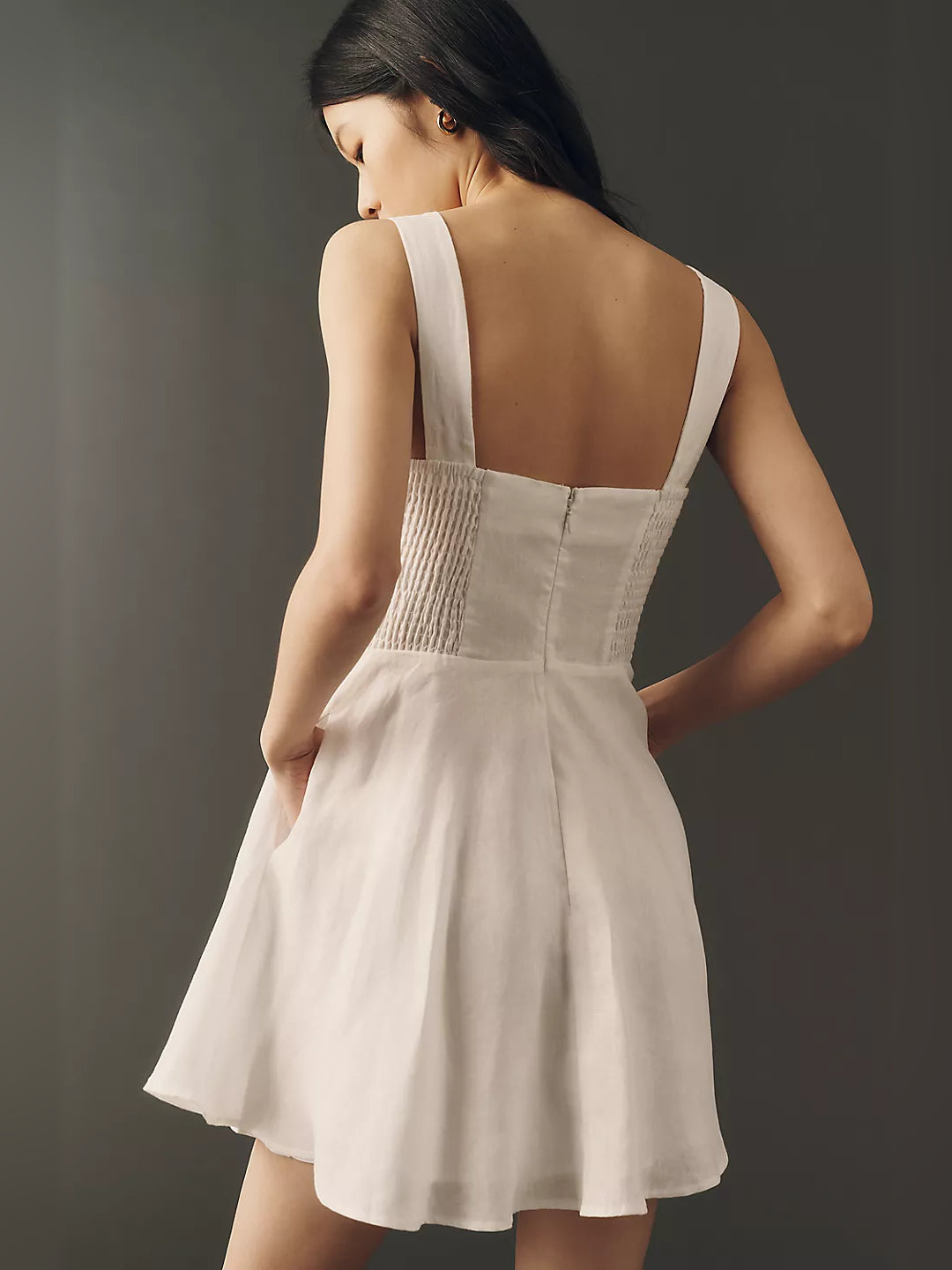 Orange mini homecoming dress, alternate view showing the dress shape and hem
